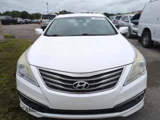 2016 Hyundai Azera z VIN KMHFG4JG3GA549216, wystawiony jako Copart lot #75050064 z przebiegiem Nie podano mil oraz Szkoda całkowita • Salvage title. Historia ofert i sprzedaży dostępna na DreamBid. Obrazek 5.