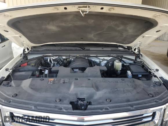 2015 Chevrolet Suburban LTZ z VIN 1GNSKKKC9FR678117, wystawiony jako Copart lot #70138934 z przebiegiem 136 271 mil mil oraz Szkoda całkowita • Salvage title. Historia ofert i sprzedaży dostępna na DreamBid. Obrazek 12.