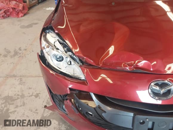 ✅ 2012 Mazda 5 Touring • VIN: JM1CW2CL3C0136544 • Lot: 42696240. Listed on IAAI with 77,400 mi. Free auction sales archive from the USA and detailed vehicle history report at DreamBid. Image 6.