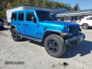 ✅ 2022 Jeep Wrangler Unlimited Sahara Altitude • VIN: 1C4HJXEGXNW105521 • Lot: 87063465. Listed on Copart with 86,243 mi. Free auction sales archive from the USA and detailed vehicle history report at DreamBid. Image 4.