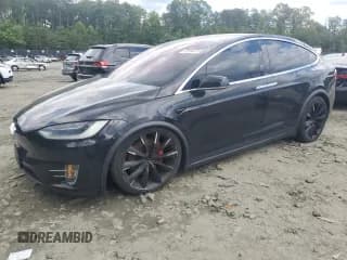 ✅ 2017 Tesla Model X P100D • VIN: 5YJXCBE48HF051739 • Lot: 57266475. Wystawiony na Copart z przebiegiem 86 094 mil. Bezpłatny archiwum sprzedaży aukcyjnych z USA i szczegółowy raport historii pojazdu na DreamBid. Zdjęcie 1.
