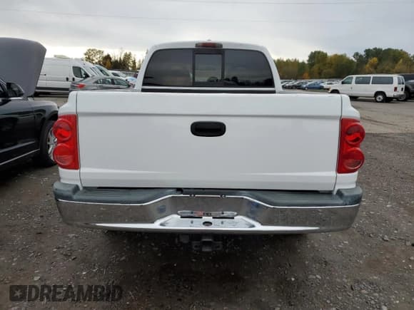 ✅ 2006 Dodge Dakota SLT • VIN: 1D7HW48N66S715103 • Лот: 90688475. Опубликован ранее на Copart с пробегом 116 859 миль. Бесплатный доступ к архиву аукционных продаж из США и подробный отчёт об истории автомобиля на DreamBid. Изображение 6.