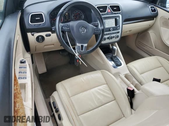 ✅ 2013 Volkswagen Eos Lux • VIN: WVWFW8AH1DV002814 • Лот: 75426404. Опубликован ранее на Copart с пробегом 60 656 миль. Бесплатный доступ к архиву аукционных продаж из США и подробный отчёт об истории автомобиля на DreamBid. Изображение 8.