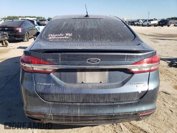✅ 2018 Ford Fusion Titanium • VIN: 3FA6P0D96JR234004 • Lot: 86815465. Wystawiony na Copart z przebiegiem 205 379 mil. Bezpłatny archiwum sprzedaży aukcyjnych z USA i szczegółowy raport historii pojazdu na DreamBid. Zdjęcie 6.