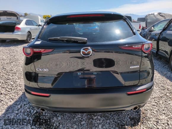 ✅ 2021 Mazda CX-30 Select • VIN: 3MVDMABLXMM252195 • Лот: 67919595. Опубликован ранее на Copart с пробегом 61 325 миль. Бесплатный доступ к архиву аукционных продаж из США и подробный отчёт об истории автомобиля на DreamBid. Изображение 6.
