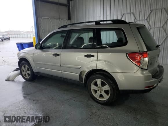 ✅ 2010 Subaru Forester X • VIN: JF2SH6BC1AH781854 • Lot: 90033625. Listed on Copart with 93,817 mi. Free auction sales archive from the USA and detailed vehicle history report at DreamBid. Image 2.