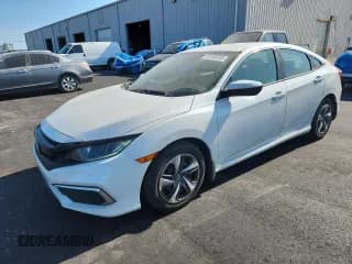 ✅ 2020 Honda Civic LX • VIN: 19XFC2F6XLE027369 • Lot: 93260815. Listed on Copart with 67,648 mi. Free auction sales archive from the USA and detailed vehicle history report at DreamBid. Image 1.