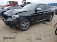 ✅ 2020 BMW X4 M40i • VIN: 5UX2V5C01L9D35126 • Lot: 87261374. Listed on Copart with 56,904 mi. Free auction sales archive from the USA and detailed vehicle history report at DreamBid. Image 1.