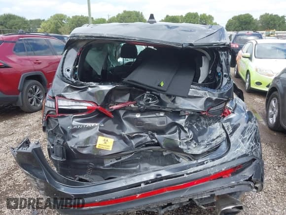 ✅ 2022 Hyundai Santa Fe SE • VIN: 5NMS14AJ9NH429794 • Lot: 42370994. Listed on IAAI with 36,649 mi. Free auction sales archive from the USA and detailed vehicle history report at DreamBid. Image 16.