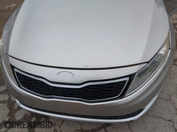 ✅ 2012 Kia Optima Hybrid • VIN: KNAGM4AD8C5008153 • Lot: 43787404. Wystawiony na IAAI z przebiegiem 160 592 mil. Bezpłatny archiwum sprzedaży aukcyjnych z USA i szczegółowy raport historii pojazdu na DreamBid. Zdjęcie 6.