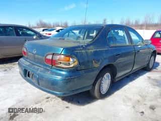 2002 Chevrolet Malibu z VIN 1G1ND52J72M569039, wystawiony jako IAAI lot #41668349 z przebiegiem 105 161 mil mil oraz . Historia ofert i sprzedaży dostępna na DreamBid. Obrazek 4.