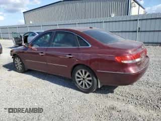 2010 Hyundai Azera Limited с VIN KMHFC4DF7AA451215, выставлен на аукционе Copart как лот 78623054 с пробегом 121 323 миль миль и Списание • Salvage title. История ставок и продаж доступна на DreamBid. Изображение 2.