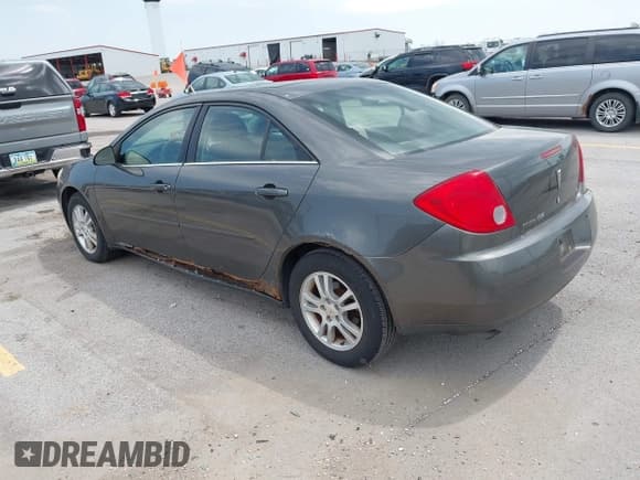 ✅ 2005 Pontiac G6 • VIN: 1G2ZG548954116740 • Lot: 42843615. Wystawiony na IAAI z przebiegiem 153 477 mil. Bezpłatny archiwum sprzedaży aukcyjnych z USA i szczegółowy raport historii pojazdu na DreamBid. Zdjęcie 3.