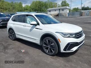 ✅ 2023 Volkswagen Tiguan SEL R-Line • VIN: 3VV4B7AX1PM034909 • Лот: 43102947. Опубликован ранее на IAAI с пробегом 22 043 миль. Бесплатный доступ к архиву аукционных продаж из США и подробный отчёт об истории автомобиля на DreamBid. Изображение 1.