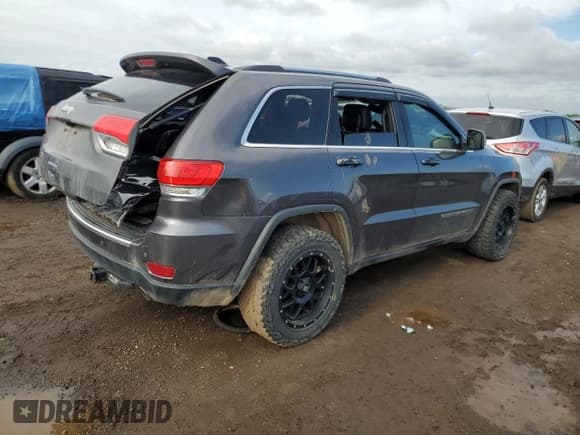 ✅ 2017 Jeep Grand Cherokee • VIN: 1C4HJFBG4HC728433 • Lot: 59215585. Listed on Copart with 143,085 mi. Free auction sales archive from the USA and detailed vehicle history report at DreamBid. Image 3.