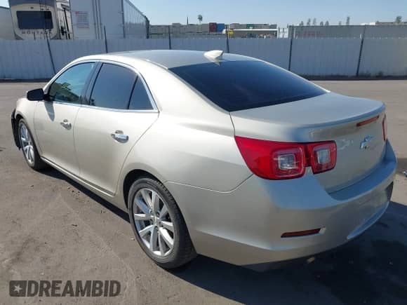 2016 Chevrolet Malibu LTZ z VIN 1G11E5SAXGF105153, wystawiony jako IAAI lot #43159960 z przebiegiem 145 269 mil mil oraz . Historia ofert i sprzedaży dostępna na DreamBid. Obrazek 3.