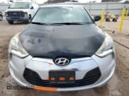 ✅ 2014 Hyundai Veloster • VIN: KMHTC6AD7EU209241 • Lot: 83997134. Wystawiony na Copart z przebiegiem 71 965 mil. Bezpłatny archiwum sprzedaży aukcyjnych z USA i szczegółowy raport historii pojazdu na DreamBid. Zdjęcie 5.