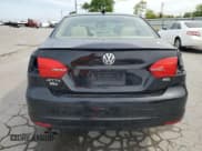 ✅ 2014 Volkswagen Jetta SEL • VIN: 3VWL17AJXEM427214 • Lot: 54179655. Listed on Copart with 168,516 mi. Free auction sales archive from the USA and detailed vehicle history report at DreamBid. Image 6.