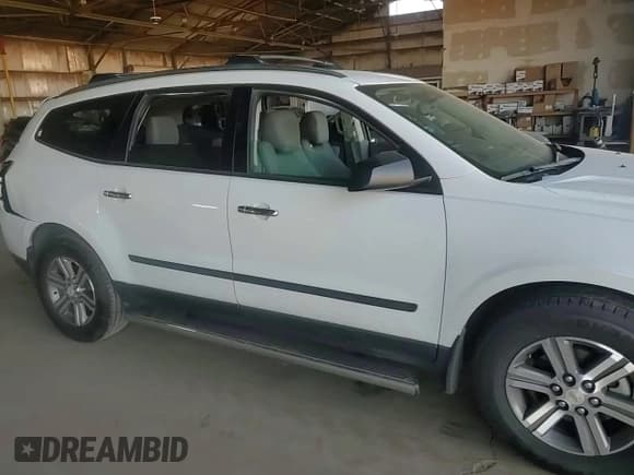 ✅ 2017 Chevrolet Traverse LS • VIN: 1GNKRFKDXHJ245712 • Lot: 67611805. Wystawiony na Copart z przebiegiem 165 058 mil. Bezpłatny archiwum sprzedaży aukcyjnych z USA i szczegółowy raport historii pojazdu na DreamBid. Zdjęcie 13.