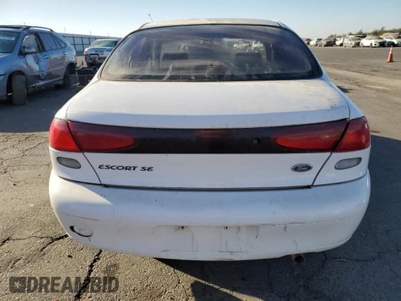 ✅ 1998 Ford Escort SE • VIN: 1FAFP13P0WW139108 • Лот: 76935594. Опубликован ранее на Copart с пробегом 28 413 миль. Бесплатный доступ к архиву аукционных продаж из США и подробный отчёт об истории автомобиля на DreamBid. Изображение 6.