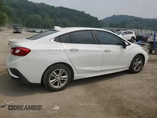 ✅ 2018 Chevrolet Cruze LT • VIN: 1G1BE5SM4J7132283 • Lot: 60313383. Listed on Copart with 129,605 mi. Free auction sales archive from the USA and detailed vehicle history report at DreamBid. Image 3.