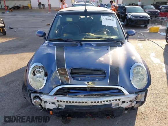 ✅ 2005 MINI Convertible S • VIN: WMWRH33475TF82636 • Lot: 43261691. Listed on IAAI with 127,918 mi. Free auction sales archive from the USA and detailed vehicle history report at DreamBid. Image 11.