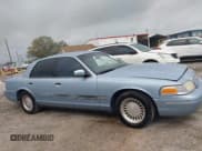 ✅ 1999 Ford Crown Victoria • VIN: 2FAFP73WXXX221069 • Lot: 41750127. Listed on IAAI with 177,142 mi. Free auction sales archive from the USA and detailed vehicle history report at DreamBid. Image 13.