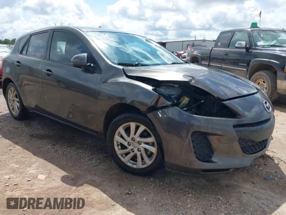 ✅ 2012 Mazda 3 i Touring • VIN: JM1BL1L8XC1686831 • Lot: 42373850. Listed on IAAI with 152,067 mi. Free auction sales archive from the USA and detailed vehicle history report at DreamBid. Image 1.