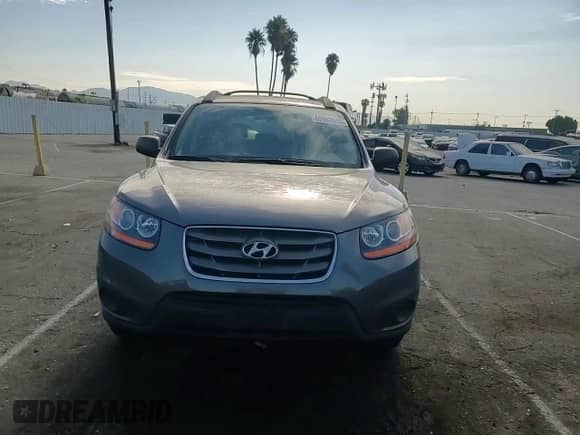 2010 Hyundai Santa Fe GLS with VIN 5NMSG3AB6AH379299, listed as a Copart auction lot 65987014 with 134,917 mi miles and Salvage title. Bid and sale history available at DreamBid. Image 11.