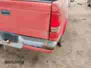 2002 Dodge Dakota Sport z VIN 1B7GL32XX2S558947, wystawiony jako IAAI lot #41538339 z przebiegiem 126 150 mil mil oraz . Historia ofert i sprzedaży dostępna na DreamBid. Obrazek 6.