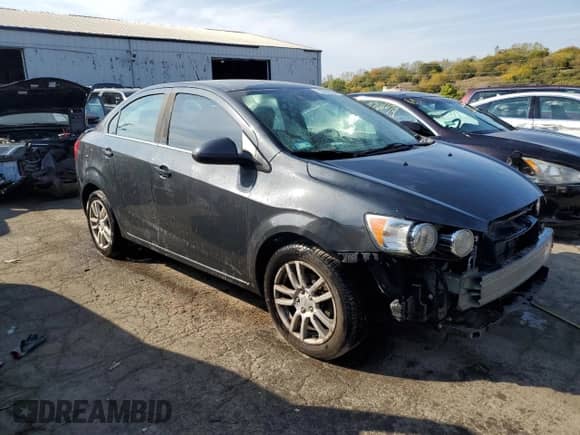 2014 Chevrolet Sonic LT с VIN 1G1JC5SH4E4106147, выставлен на аукционе Copart как лот 71822594 с пробегом 167 145 миль миль и Списание • Salvage title. История ставок и продаж доступна на DreamBid. Изображение 4.