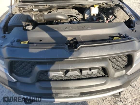 2020 Ram 1500 Rebel с VIN 1C6RRELT7LN299176, выставлен на аукционе Copart как лот 76778334 с пробегом 70 059 миль миль и Списание • Salvage title. История ставок и продаж доступна на DreamBid. Изображение 12.