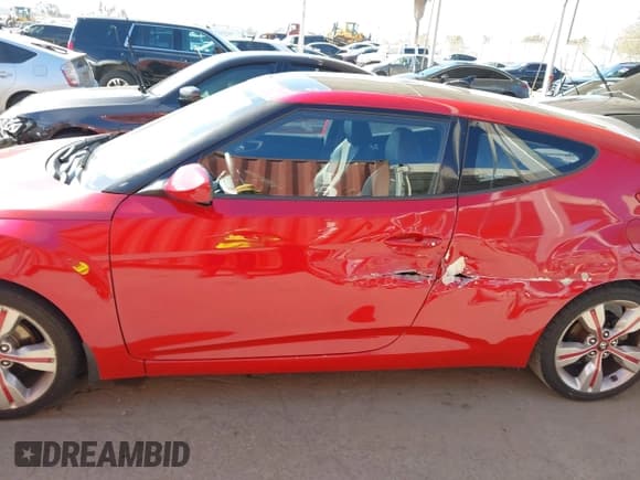 ✅ 2013 Hyundai Veloster w/Black Int • VIN: KMHTC6AD1DU118187 • Лот: 43417935. Опубликован ранее на IAAI с пробегом 125 169 миль. Бесплатный доступ к архиву аукционных продаж из США и подробный отчёт об истории автомобиля на DreamBid. Изображение 14.