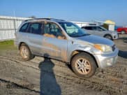 ✅ 2003 Toyota RAV4 • VIN: JTEGH20V830107215 • Лот: 94493765. Опубликован ранее на Copart с пробегом 252 429 миль. Бесплатный доступ к архиву аукционных продаж из США и подробный отчёт об истории автомобиля на DreamBid. Изображение 4.