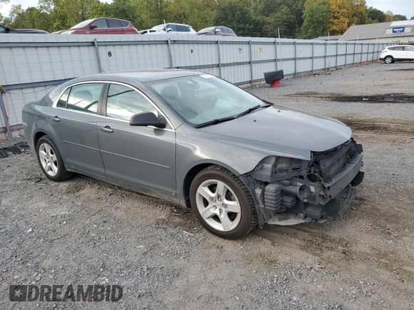 2009 Chevrolet Malibu 1LS z VIN 1G1ZG57B69F134358, wystawiony jako Copart lot #72314554 z przebiegiem 194 373 mil mil oraz Szkoda całkowita • Salvage title. Historia ofert i sprzedaży dostępna na DreamBid. Obrazek 4.