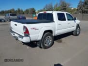 ✅ 2012 Toyota Tacoma • VIN: 3TMLU4EN6CM089216 • Lot: 43336629. Listed on IAAI with 135,350 mi. Free auction sales archive from the USA and detailed vehicle history report at DreamBid. Image 4.
