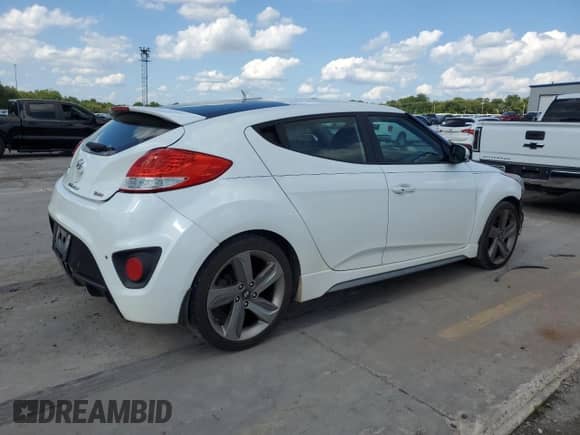 2013 Hyundai Veloster Turbo с VIN KMHTC6AE9DU171583, выставлен на аукционе Copart как лот 67222235 с пробегом 148 246 миль миль и Списание • Salvage title. История ставок и продаж доступна на DreamBid. Изображение 3.