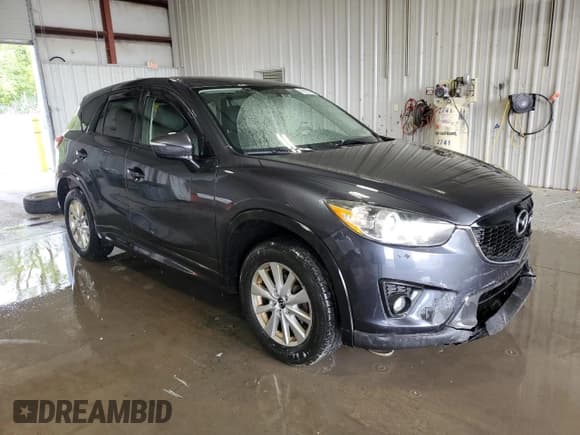 ✅ 2015 Mazda CX-5 Touring • VIN: JM3KE2CY6F0506259 • Lot: 69928775. Listed on Copart with 140,555 mi. Free auction sales archive from the USA and detailed vehicle history report at DreamBid. Image 4.