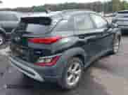 2023 Hyundai Kona SEL with VIN KM8K6CAB4PU932659, listed as a IAAI auction lot 43267186 with 82,586 mi miles and . Bid and sale history available at DreamBid. Image 4.