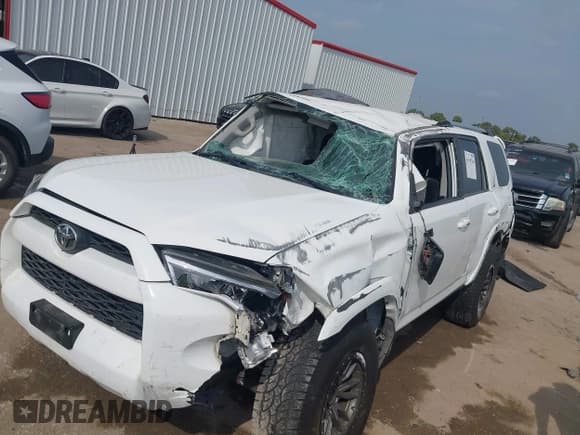 ✅ 2019 Toyota 4Runner SR5 • VIN: JTEZU5JR9K5201094 • Lot: 43519344. Listed on IAAI with 131,022 mi. Free auction sales archive from the USA and detailed vehicle history report at DreamBid. Image 6.