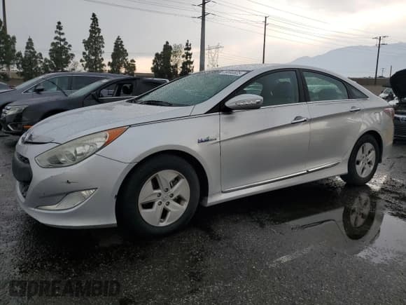✅ 2012 Hyundai Sonata Hybrid • VIN: KMHEC4A40CA030499 • Lot: 59590825. Listed on Copart with 125,184 mi. Free auction sales archive from the USA and detailed vehicle history report at DreamBid. Image 1.