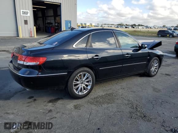 ✅ 2009 Hyundai Azera Limited • VIN: KMHFC46F39A343005 • Lot: 91314205. Listed on Copart with 95,938 mi. Free auction sales archive from the USA and detailed vehicle history report at DreamBid. Image 3.
