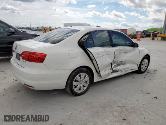 ✅ 2013 Volkswagen Jetta SE • VIN: 3VWBX7AJ8DM430329 • Lot: 81820365. Listed on Copart with 125,159 mi. Free auction sales archive from the USA and detailed vehicle history report at DreamBid. Image 3.