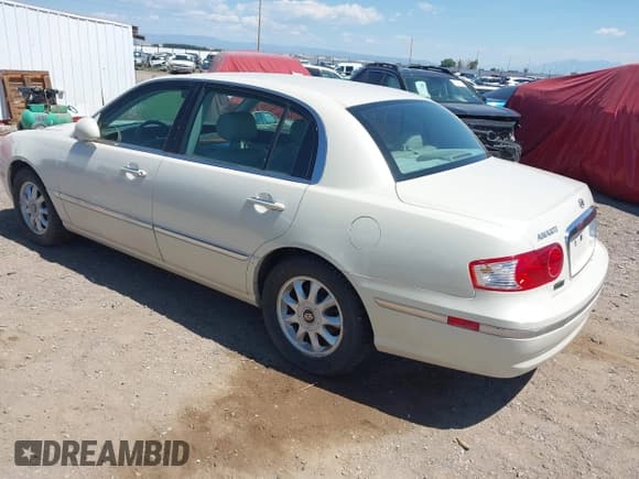 ✅ 2004 Kia Amanti • VIN: KNALD124X45023346 • Lot: 43012500. Wystawiony na IAAI z przebiegiem 98 435 mil. Bezpłatny archiwum sprzedaży aukcyjnych z USA i szczegółowy raport historii pojazdu na DreamBid. Zdjęcie 3.