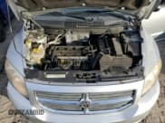 ✅ 2010 Dodge Caliber SXT • VIN: 1B3CB4HA2AD576034 • Лот: 83079904. Опубликован ранее на Copart с пробегом 174 867 миль. Бесплатный доступ к архиву аукционных продаж из США и подробный отчёт об истории автомобиля на DreamBid. Изображение 11.