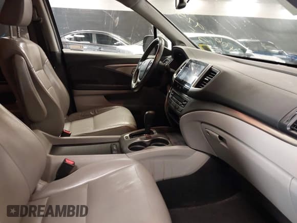 ✅ 2018 Honda Pilot EX-L • VIN: 5FNYF6H7XJB053927 • Лот: 40659757. Опубликован ранее на IAAI с пробегом 125 182 миль. Бесплатный доступ к архиву аукционных продаж из США и подробный отчёт об истории автомобиля на DreamBid. Изображение 5.