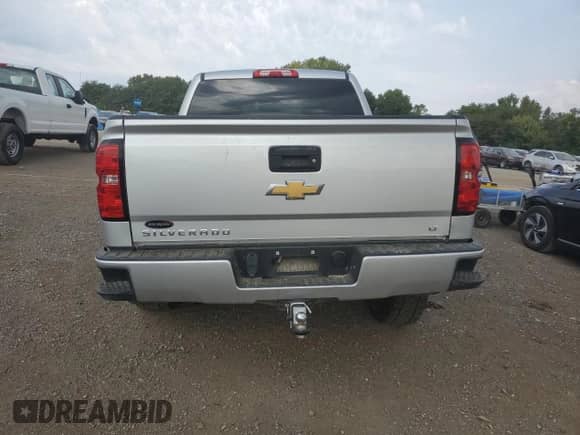 2018 Chevrolet Silverado 1500 LT с VIN 3GCUKREC2JG503173, выставлен на аукционе Copart как лот 80928005 с пробегом 107 558 миль миль и Списание • Salvage title. История ставок и продаж доступна на DreamBid. Изображение 6.