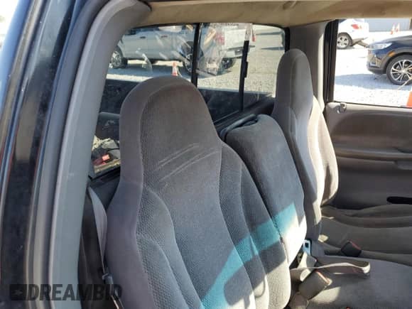 2000 Dodge Dakota Sport z VIN 1B7GG26N7YS667611, wystawiony jako Copart lot #71181355 z przebiegiem 218 471 mil mil oraz Szkoda całkowita • Salvage title. Historia ofert i sprzedaży dostępna na DreamBid. Obrazek 10.