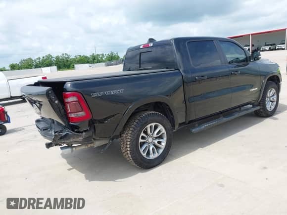 2020 Ram 1500 Laramie with VIN 1C6RREJT2LN295149, listed as a IAAI auction lot 42411146 with 113,445 mi miles and . Bid and sale history available at DreamBid. Image 4.