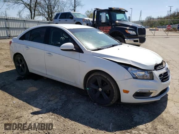 ✅ 2015 Chevrolet Cruze LT • VIN: 1G1PE5SB6F7277398 • Lot: 47113733. Listed on Copart with 105,080 mi. Free auction sales archive from the USA and detailed vehicle history report at DreamBid. Image 4.